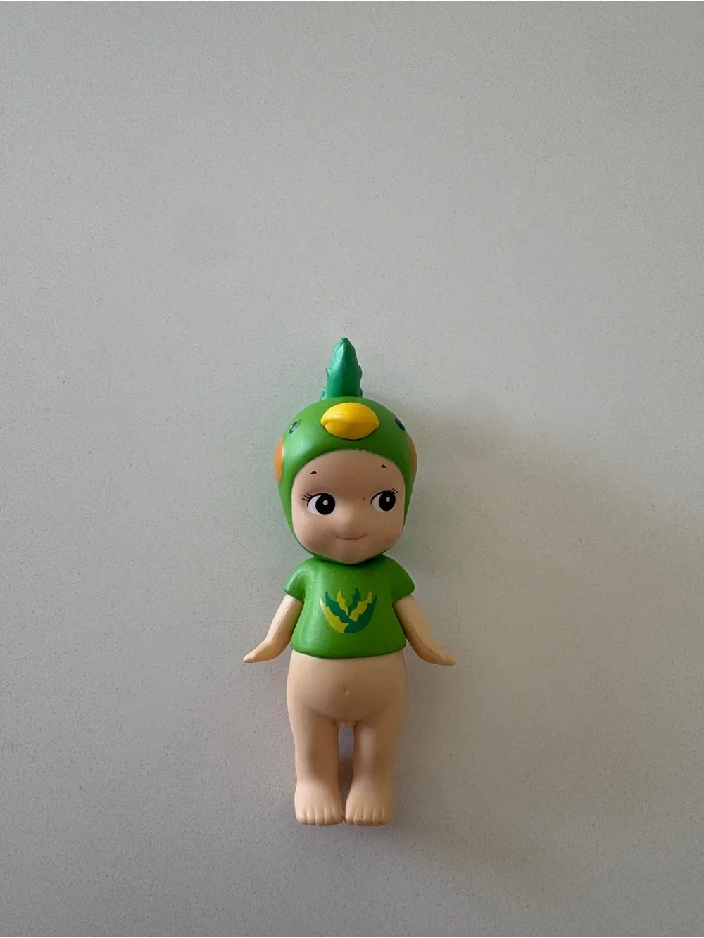 Green Baby Doll Figure in Bird Costume - Kids Toy